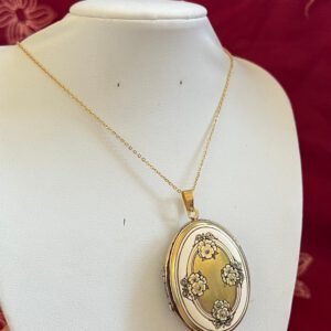 The gilded antique locket